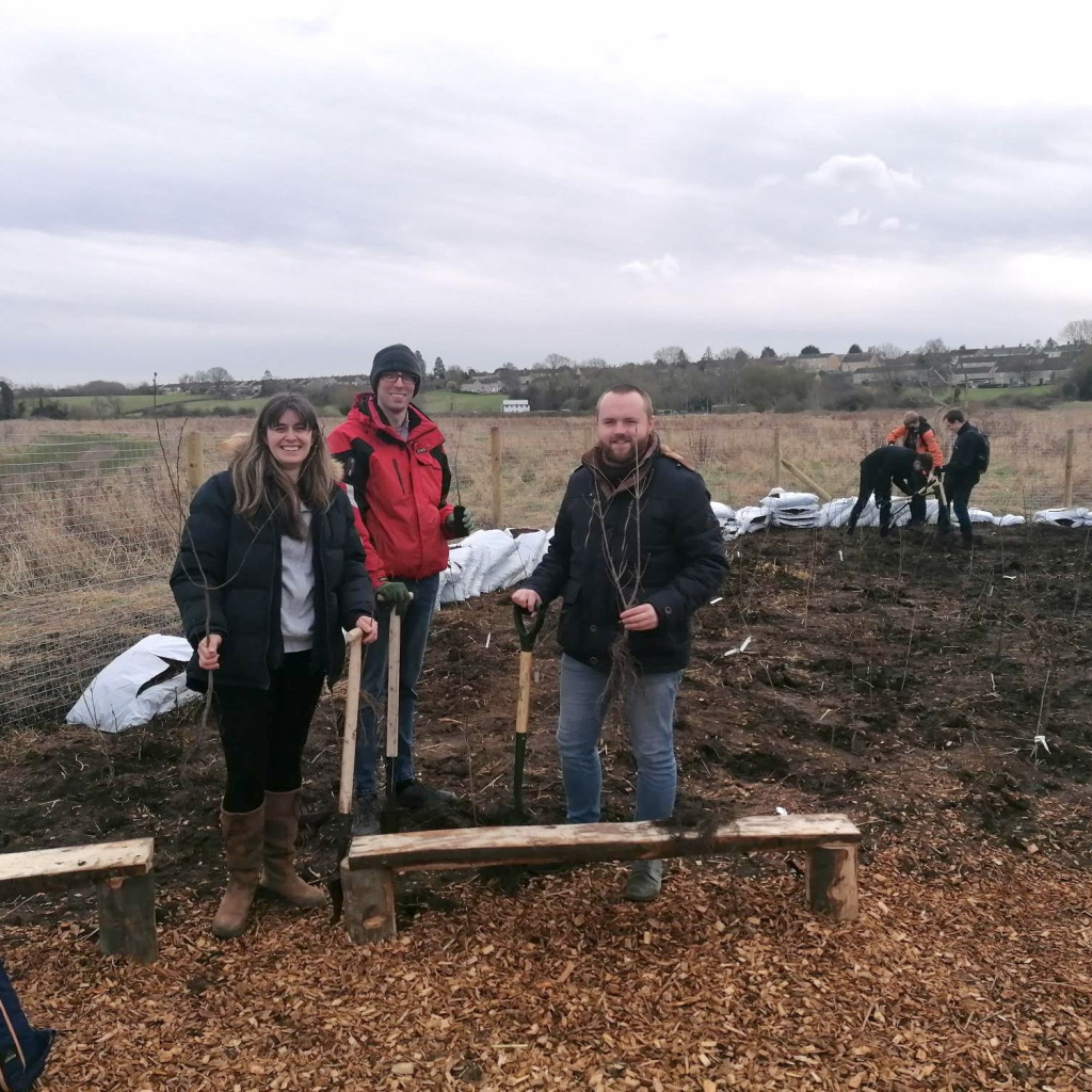 Caice colleagues volunteering to help create a tiny forest
